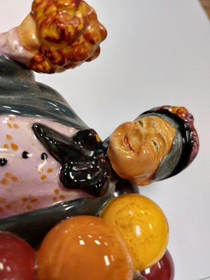 Lot 214 - A collection of Royal Doulton figures to...