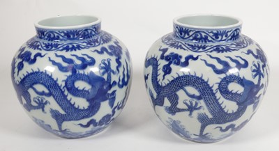 Lot 234 - A pair of Chinese export blue and white vases,...