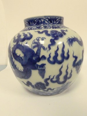 Lot 234 - A pair of Chinese export blue and white vases,...