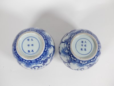 Lot 234 - A pair of Chinese export blue and white vases,...