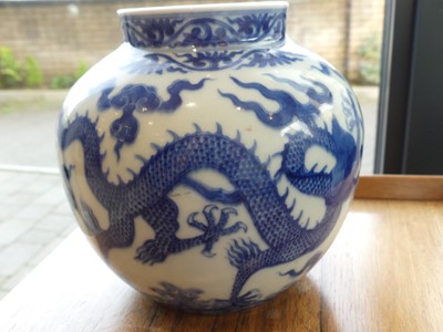 Lot 234 - A pair of Chinese export blue and white vases,...