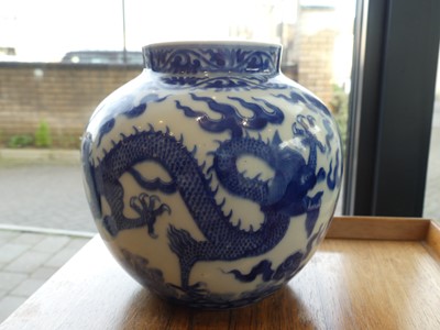 Lot 234 - A pair of Chinese export blue and white vases,...