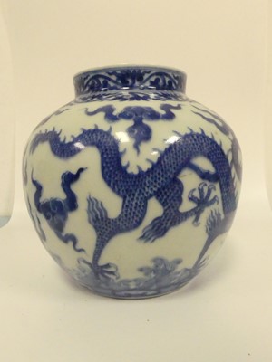 Lot 234 - A pair of Chinese export blue and white vases,...