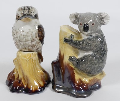 Lot 238 - A ceramic figure of a koala signed Grace...