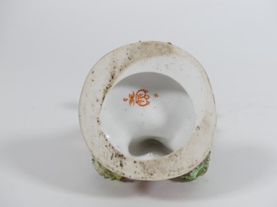 Lot 240 - A Crown Derby figure of a boy holding flowers,...