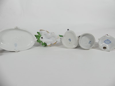 Lot 254 - A collection of continental porcelain figures...