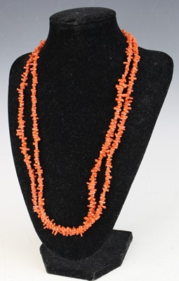 Lot 392 - A natural coral long necklace, 110cm