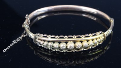 Lot 402 - A vintage 9ct gold hollow bangle, with...