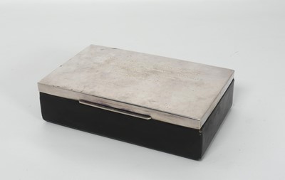 Lot 299 - A table cigarette box of typical hinged...