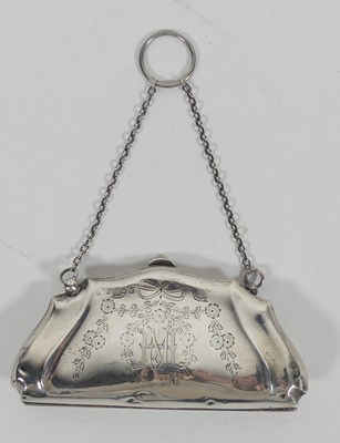 Lot 289 - A George V silver clad ladies purse, suspended...