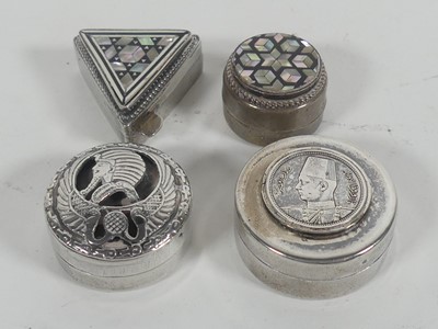 Lot 306 - A group of four white metal pill boxes, 2.2ozt