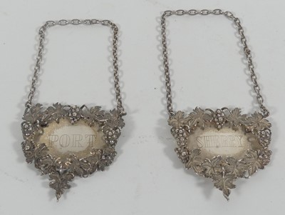 Lot 307 - A pair of Elizabeth II silver decanter labels,...