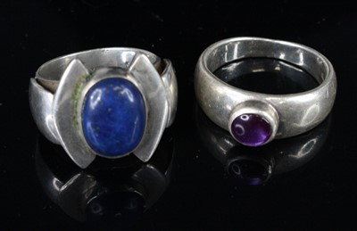 Lot 407 - A contemporary silver and cabochon purple...