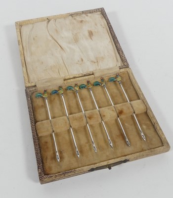 Lot 310 - A set of six George V silver cocktail sticks,...