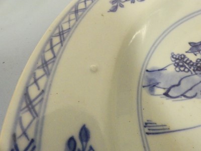 Lot 245 - Two Chinese celadon plates; together with two...