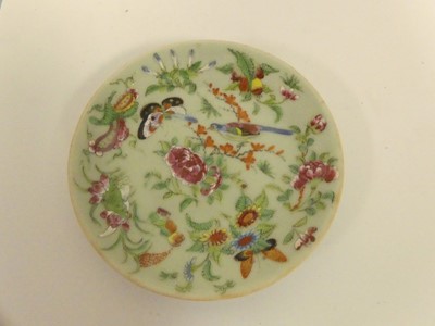 Lot 245 - Two Chinese celadon plates; together with two...