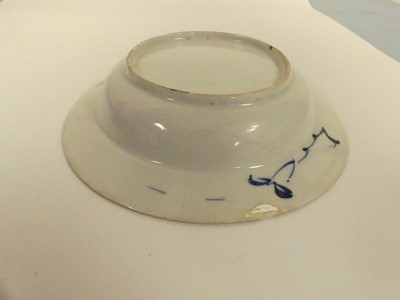 Lot 245 - Two Chinese celadon plates; together with two...