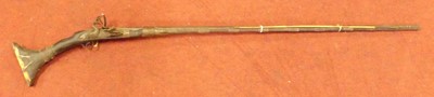 Lot 577 - A Middle Eastern Jezil Matchlock long arm...