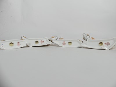 Lot 257 - Four Royal Crown Derby paperweights, all with...