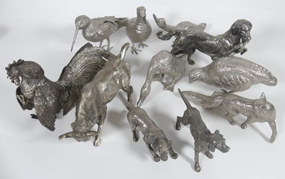 Lot 261 - A collection of silver coloured metal animals,...