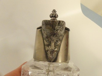 Lot 266 - A pair of silver plated and glass claret jugs,...