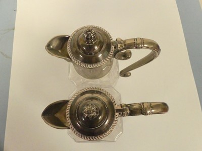 Lot 266 - A pair of silver plated and glass claret jugs,...