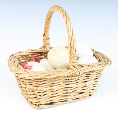 Lot 831 - A small wicker trug containing seven decoy eggs.