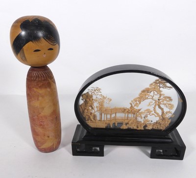 Lot 565 - A Chinese carved cork scene together with an...