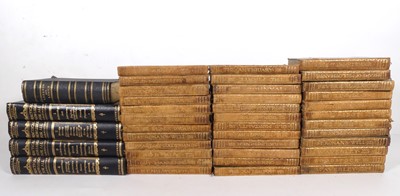 Lot 574 - A box of books to include a large quantity of...