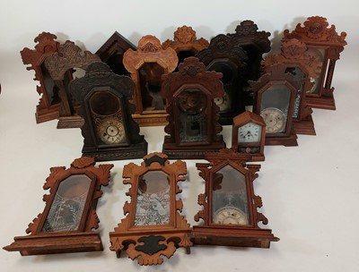 Lot 92 - A collection of sixteen clocks/clock cases for...