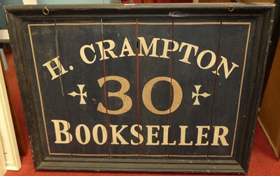 Lot 1070 - A reproduction painted wooden hanging sign for...