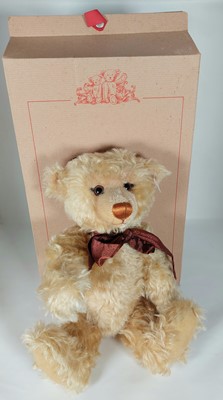 Lot 678 - A year 2000 Steiff teddy-bear (blond 43),...