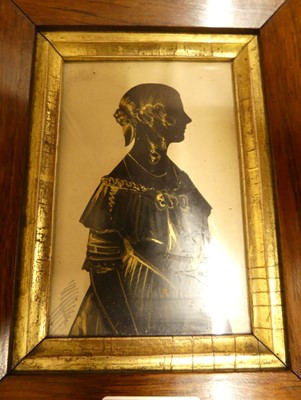 Lot 1095 - A mid 19th century portrait silhouette...