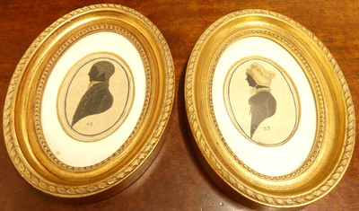 Lot 1098 - A pair of George IV portrait silhouettes of...