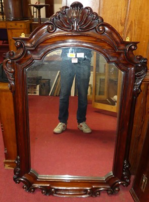 Lot 1133 - A Victorian style mahogany framed wall mirror,...