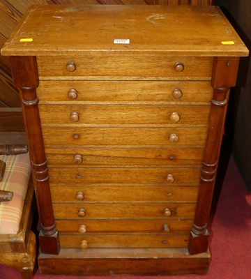 Lot 1134 - A Victorian oak collector's chest arranged as...