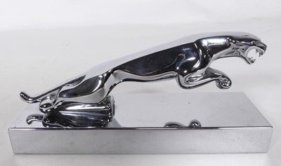 Lot 575 - A chromed metal Jaguar desk weight, length 19cm