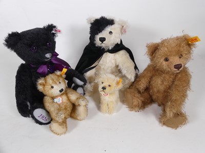 Lot 603 - Four Steiff teddy bears and one Steiff dog,...