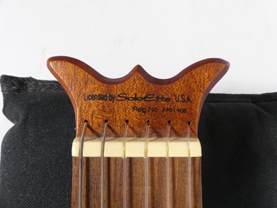 Lot 607 - An Aria Sinsonido travel guitar