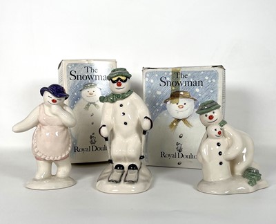 Lot 160 - A group of thee Royal Doulton The Snowman Gift...