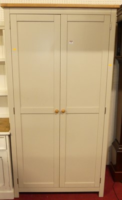 Lot 1140 - A modern painted and blond oak double door...