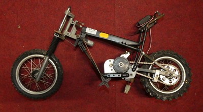 Lot 1570 - A part-complete battery operated motorcycle,...