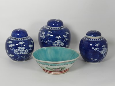 Lot 120 - A Chinese porcelain blue and white prunus...