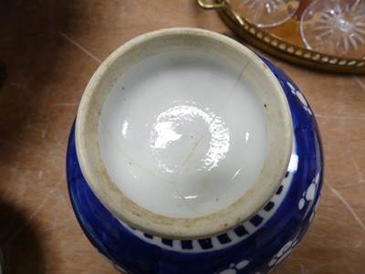 Lot 120 - A Chinese porcelain blue and white prunus...