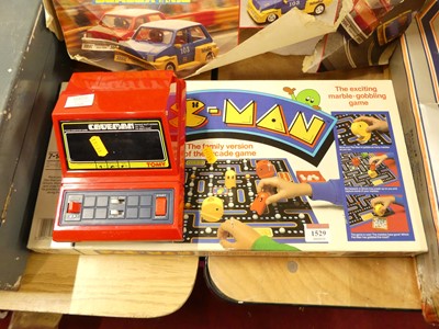 Lot 1529 - A Tomy Caveman electronic game, and a boxed MD...