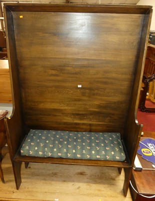 Lot 1187 - A made-up hardwood settle, with high back,...