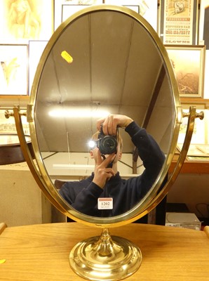 Lot 1202 - A reproduction lacquered brass dressing table...