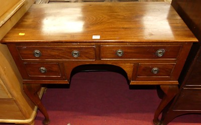 Lot 1225 - A mahogany kneehole dressing table, having...