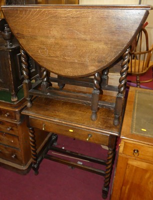 Lot 1328 - An oak single drawer side table, width 74cm,...