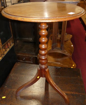 Lot 1334 - A Victorian mahogany pedestal tripod table on...